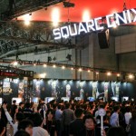 Visitors look at Square Enix Co.'s video game titles display