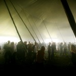 Crowd in a tent. Gloabal Gathering festival 2005, Long Marston Airfield, Stratford Upon Avon. UK. July 2005