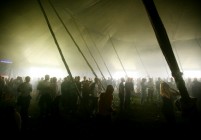 Crowd in a tent. Gloabal Gathering festival 2005, Long Marston Airfield, Stratford Upon Avon. UK. July 2005